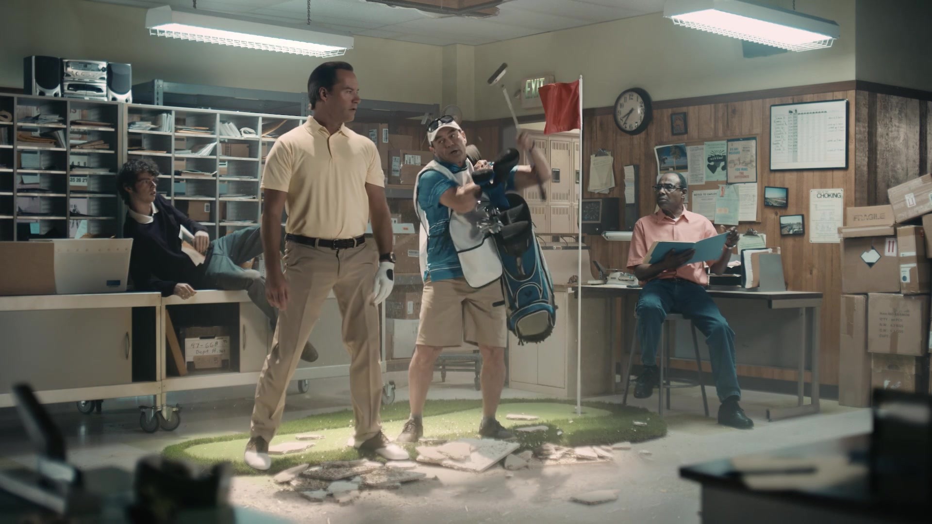 Special Delivery — Two golfers in a mail room after crashing down through the ceiling